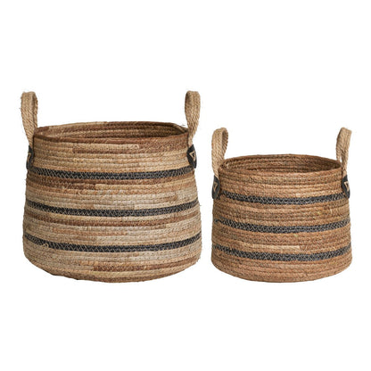 Détail tressage et bandes noires du panier Erba – gros plan fond blanc